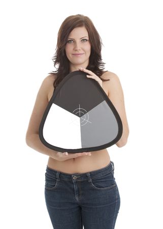 Beautiful model holding photographic grey white balance cardの写真素材