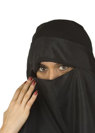 Beautiful Middle eastern woman in niqab traditional veil against a white backgroundの写真素材