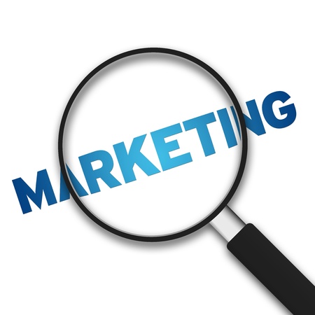 Magnifying Glass with the word marketing on white backgroundの写真素材
