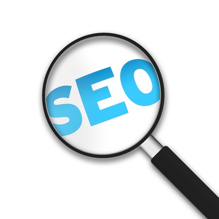 Magnifying Glass with the word SEO on white background.の写真素材