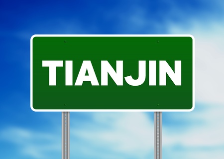 Green Tianjin, China highway sign on Cloud Background.の写真素材