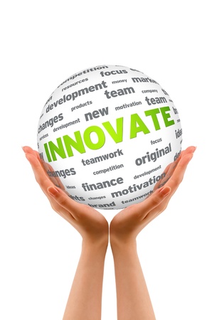 Hands holding a Innovate Sphere sign on white background.の写真素材