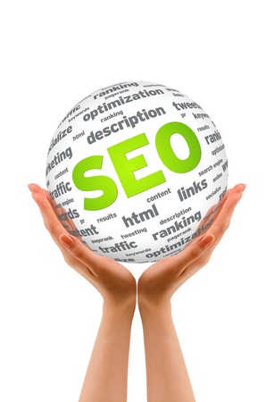 Hands holding a SEO Sphere sign on white background.の写真素材