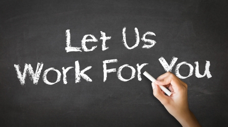 A person drawing and pointing at a Let Us Work For You Chalk Illustrationの写真素材