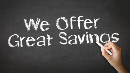 A person drawing and pointing at a We offer Great Savings Chalk Illustrationの写真素材
