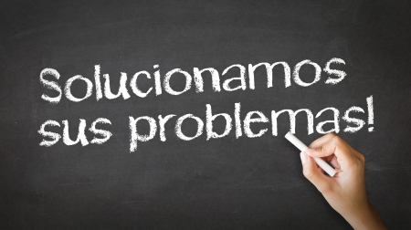 A person drawing and pointing at a We Solve Problems Chalk Illustrationの写真素材