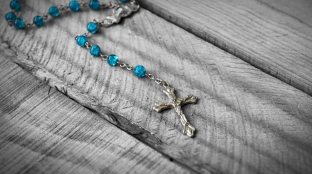 Closeup of a Rosary on wooden backgroundの写真素材