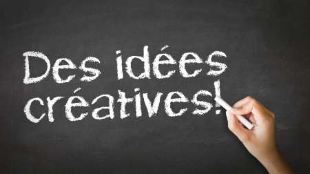 A person drawing and pointing at a Creative ideas Chalk Illustrationの写真素材