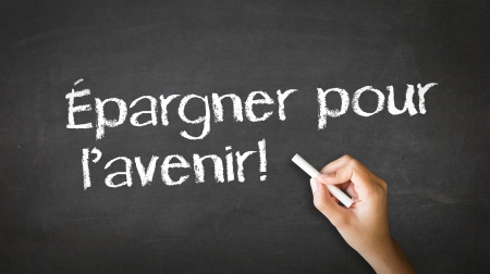 A person drawing and pointing at a Save For Your Future Chalk Illustrationの写真素材