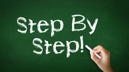 A person drawing and pointing at a Step by Step Chalk Illustrationの写真素材