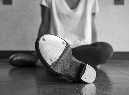 Black and white version of Tap dancer relaxing in classの写真素材