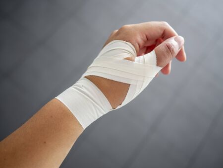 Thumb tape job for a thumb sprainの写真素材