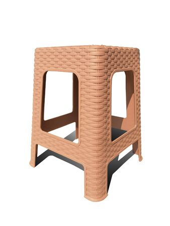 Brown woven chair with white backdropの写真素材