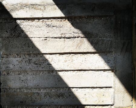 Light and shadow on the concrete wallの写真素材