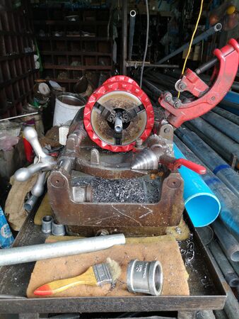Steel tube lathe with multi-size pipes and accessoriesの写真素材