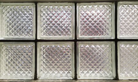 Patterned glass blocks with sunshineの写真素材
