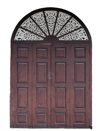 Old wooden door At the ancient gingerbread house,isolated on white background, Lampang, Thailandの写真素材