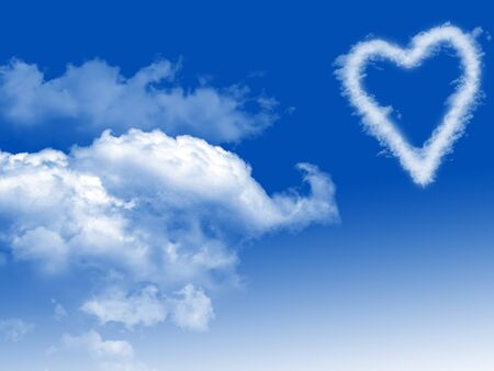 clouds  heart shape in blue skyの写真素材