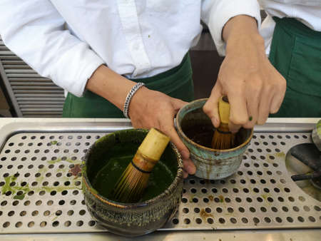 Bonsai trees in pots with white wallsの写真素材