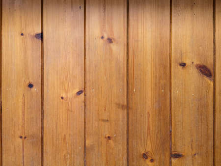 Pine walls wooden panel are a background texture vertical aligned.の写真素材