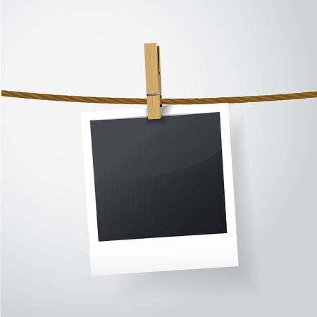 blank photo frame on rope over white backgroundのイラスト素材
