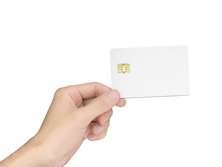 man's hand holding a blank chip card over white backgroundの写真素材