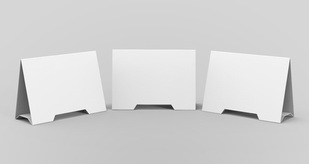 Blank table tent, 3d render table card set mockup for design uses, triangular paper card for business meeting or restaurant menuの写真素材