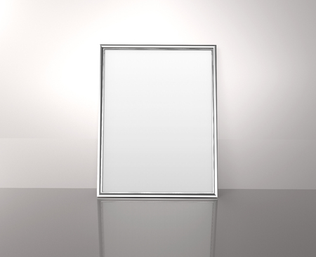 Glossy silver color photo frame with blank copy space leaning on the wall in 3d renderingの写真素材