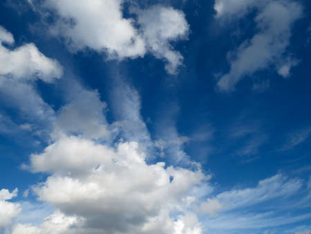 blue sky is covered by white clouds
