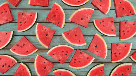 watermelon slice on wooden background. summer color. 3d rendering.の写真素材