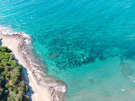 Coastal view of beautiful Aegean sea and seashore. Aerial drone view of summer landscape with blue...