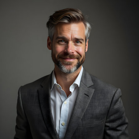 Portrait of a handsome mature man with gray hair and beard.の素材