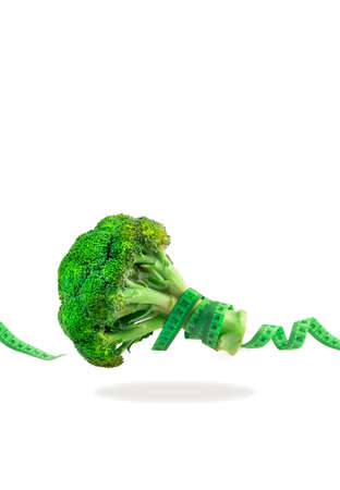 Body tape measure and broccoli.の写真素材