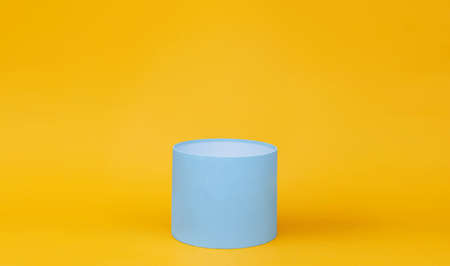Blue round gift box on trendy background.の写真素材