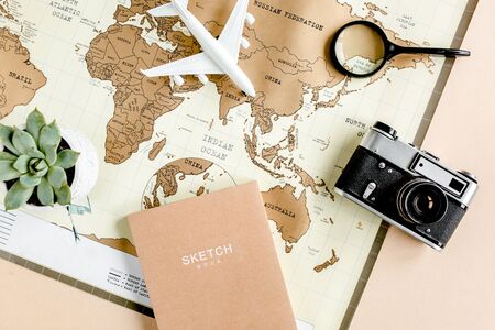 Planning vacation, travel plan, trip vacation using world map along with other travel accessories....