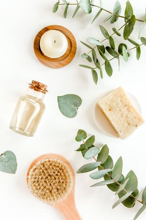 Spa Background. Natural, Organic spa cosmetics products, eco friendly bathroom accessories, eucalyptus leaves. Skincare concept on white background.の写真素材