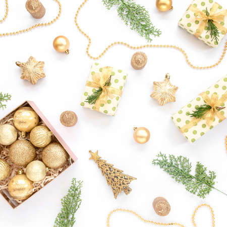 Christmas or new year texture. Christmas decorations in gold colors on white background. Holiday and...