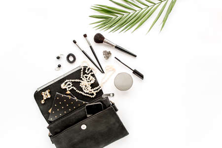 Makeup tools. Home office workspace. Female fashion, makeup brushes, cup of coffee on white background. Flat composition. Top view. Flat lay.の写真素材