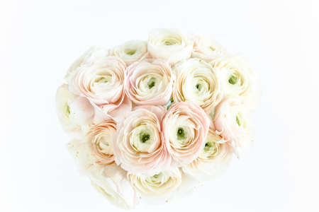 Bouquet, texture of pink ranunculus and roses flower close up. Flat lay, top view. Ranunculus flower...