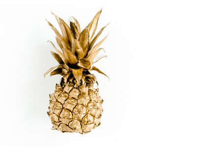 Top view golden pineapple isolated on white background. Food concept. Template blog social media....