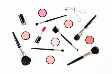Professional decorative cosmetics, makeup tools on white background. Flat composition beauty, fashion. flat lay, top viewの写真素材