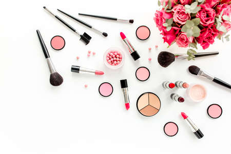Professional decorative cosmetics, makeup tools brushes on white background. Flat composition beauty, fashion. magazines, social. flat lay, top viewの写真素材