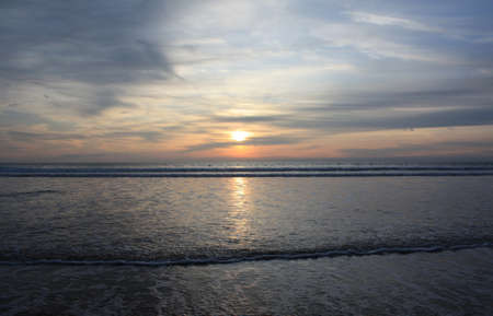 The ebbing and flowing tide as the Sunsets  - Bude, Cornwallの写真素材