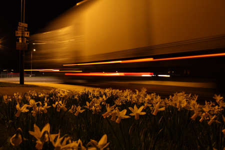 Truck speeding passed a roundaboutの写真素材