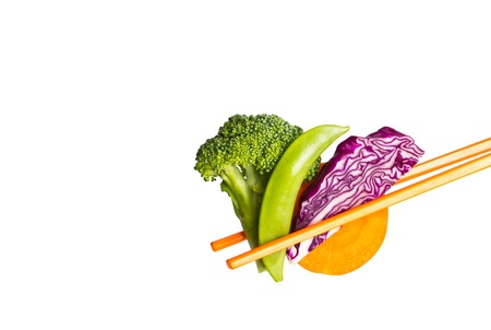 fresh vegetable with chopsticks isolated on white backgroundの写真素材