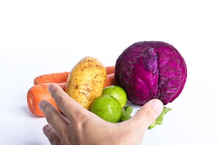 hand picking fresh assorted vegetableの写真素材
