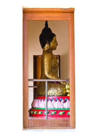 Buddha image looking from the window ,thailand templeの写真素材