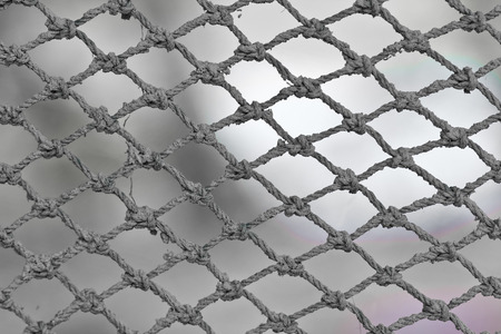Old safety net close up, black and white picture styleの写真素材