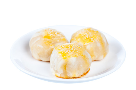 Chinese pastry or moon cake, Traditional Thai cake on dish, Taiwan delicious dessert, shot in studio, isolated on white backgroundの写真素材