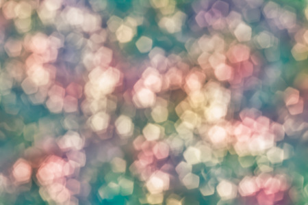 Defocused Bokeh, twinkling lights vintage blurred bokeh abstract light spring forest background....